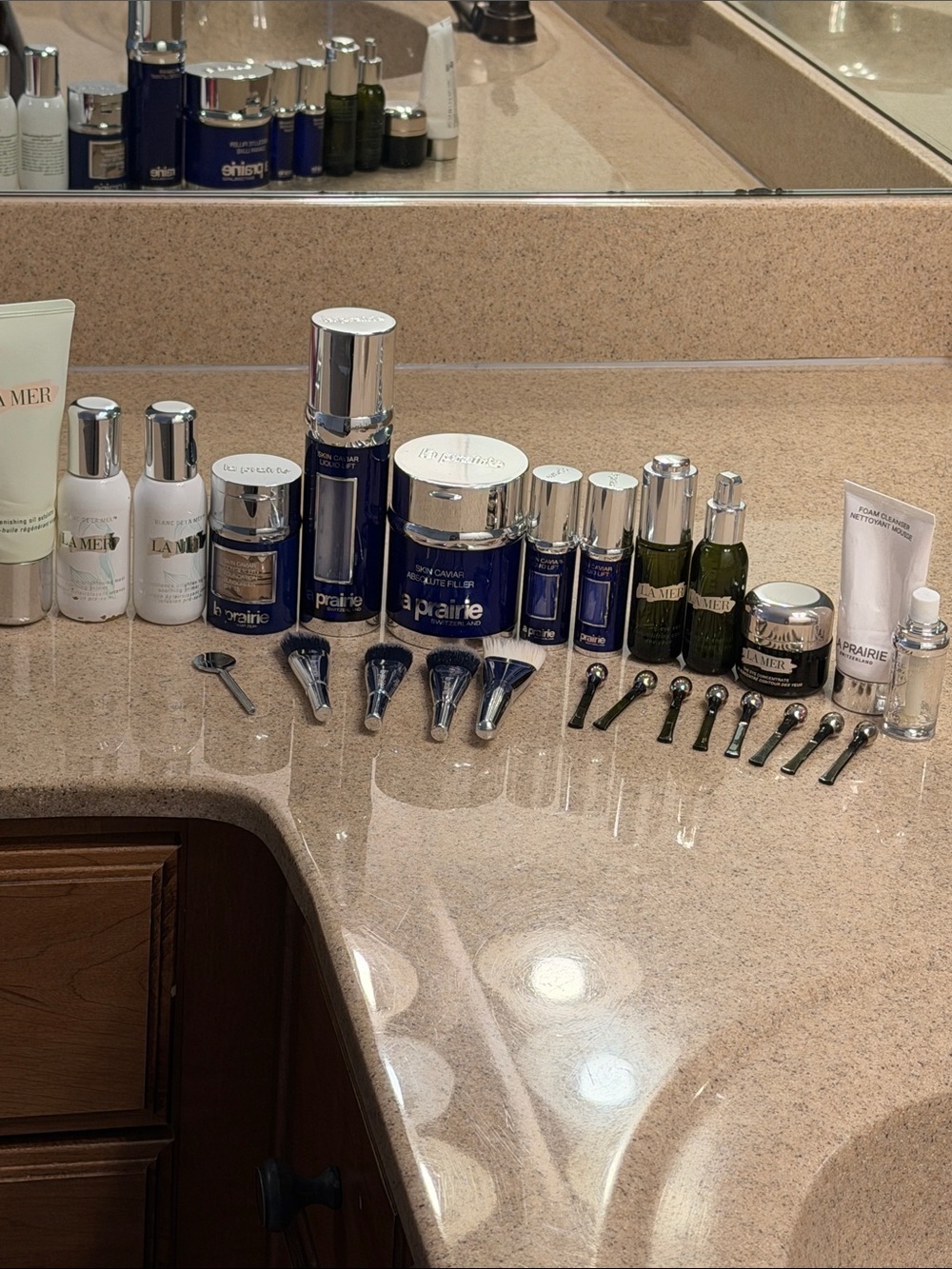 La Prairie & La Mer Mixed Skincare Set bottles & applicators